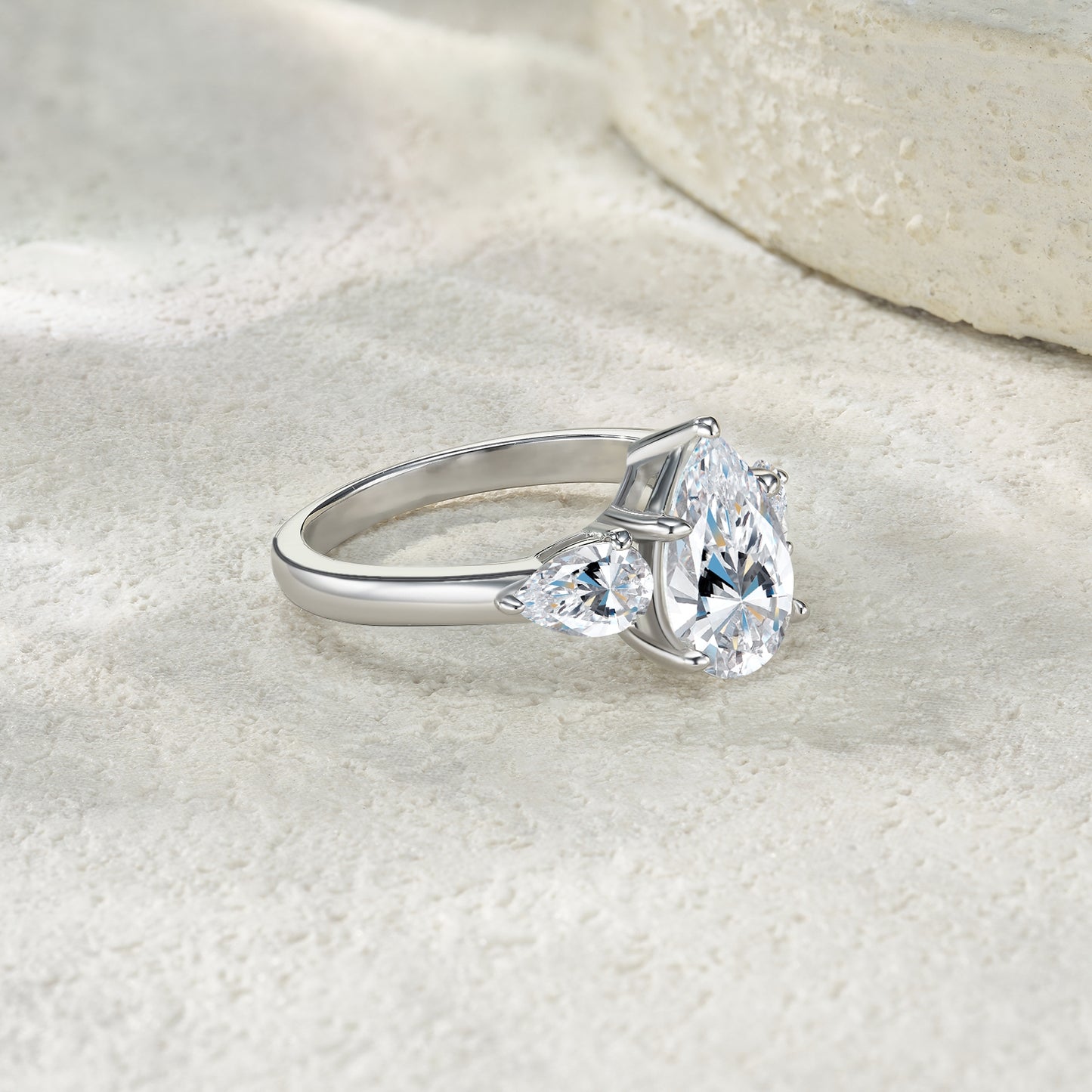 Pear Cut Three-Stone Moissanite Ring