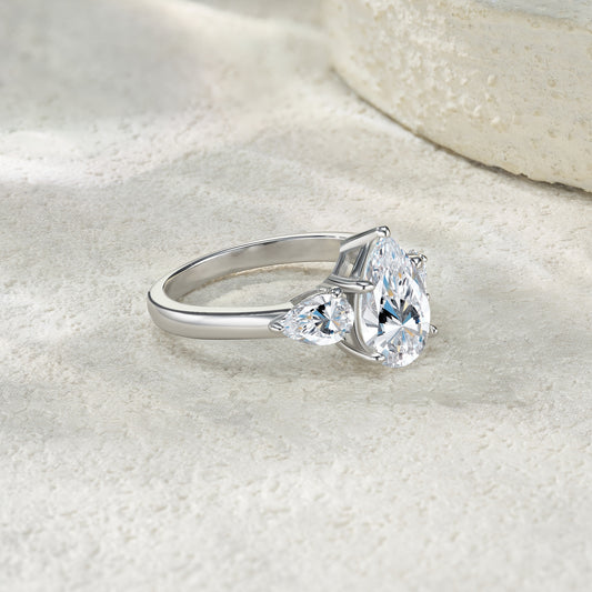 Pear Cut Three-Stone Moissanite Ring